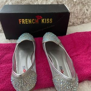 Slightly worn jeweled flats